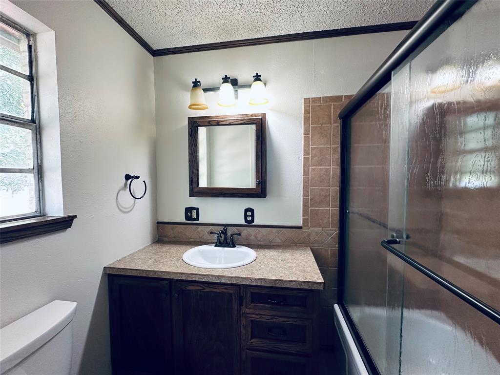 303 North Victor Street Comanche, TX 76442 - Photo 7 of 12