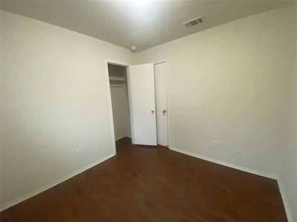 an empty room with an entryway