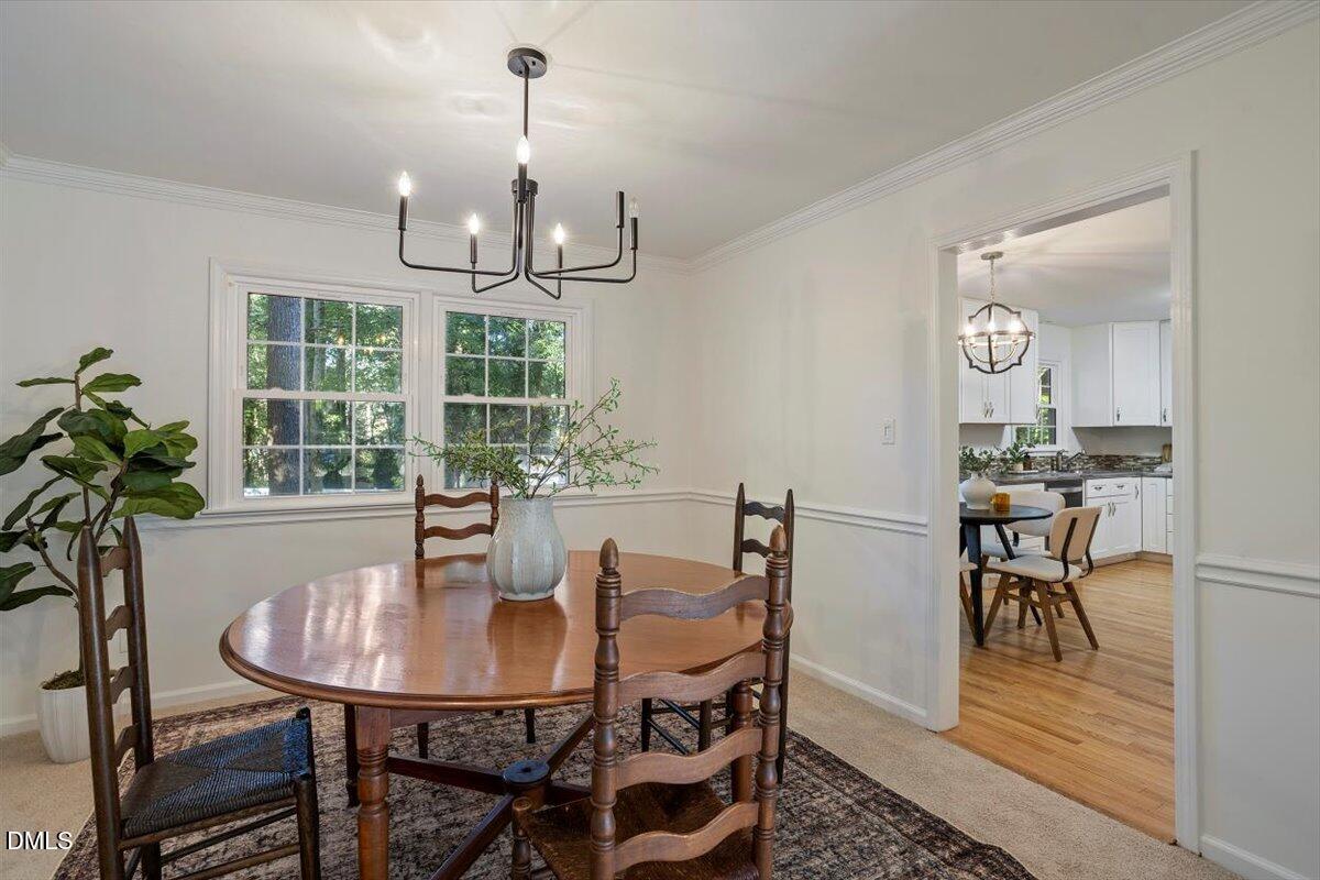 2828 McDowell Road Durham, NC 27705 - Photo 22 of 45 a view of a dining room with furniture window and outside view