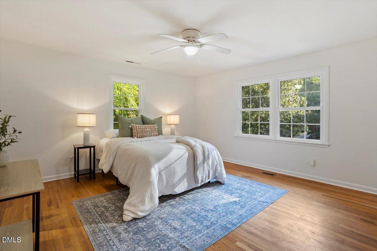 2828 McDowell Road Durham, NC 27705 - Photo 23 of 45 a bedroom with a bed and a window