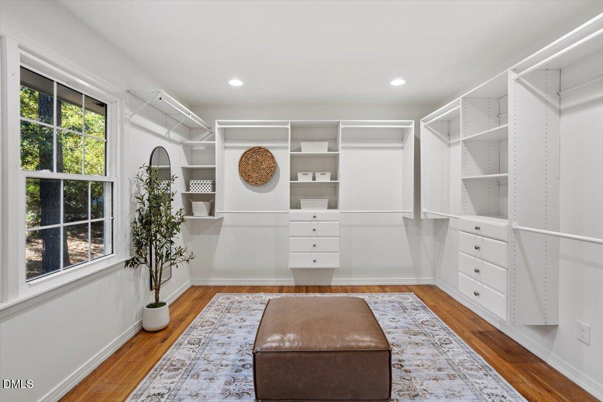 2828 McDowell Road Durham, NC 27705 - Photo 27 of 45 a view of a hallway with windows and chandelier