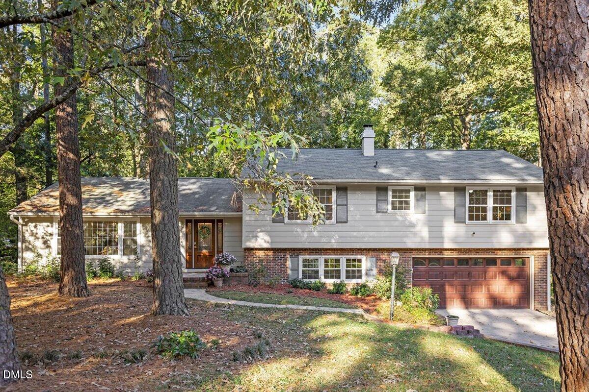 2828 McDowell Road Durham, NC 27705 - Photo 2 of 45 front view of a house with a yard