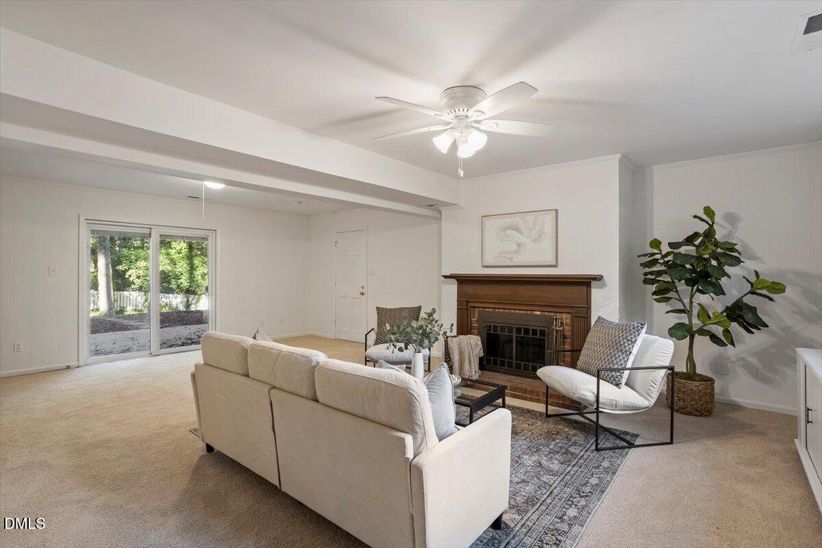 2828 McDowell Road Durham, NC 27705 - Photo 35 of 45 a living room with furniture and a fireplace