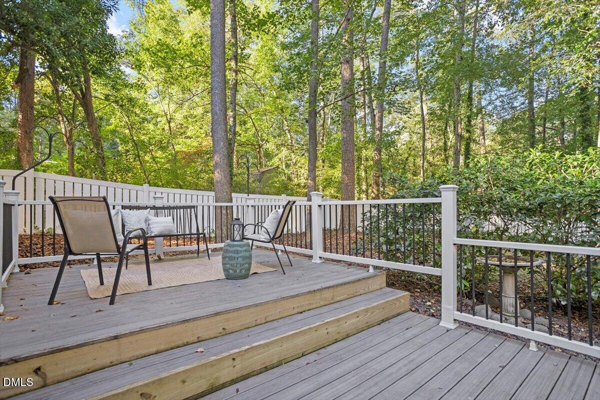 2828 McDowell Road Durham, NC 27705 - Photo 38 of 45 a view of a chairs and table on the wooden deck