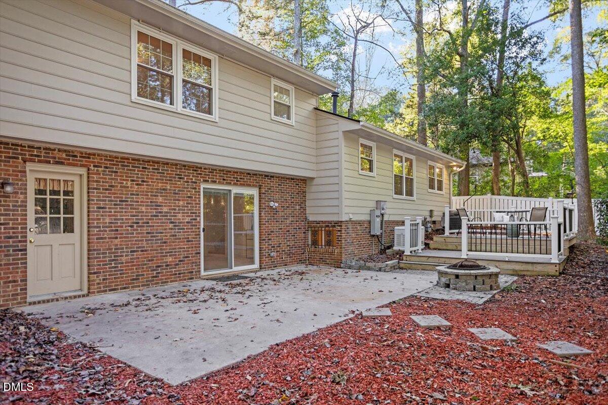 2828 McDowell Road Durham, NC 27705 - Photo 43 of 45 a backyard of a house with table and chairs