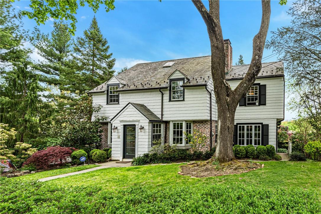 21 Argyle Road Scarsdale, NY 10583 - Photo 1 of 1 a front view of a house with a yard