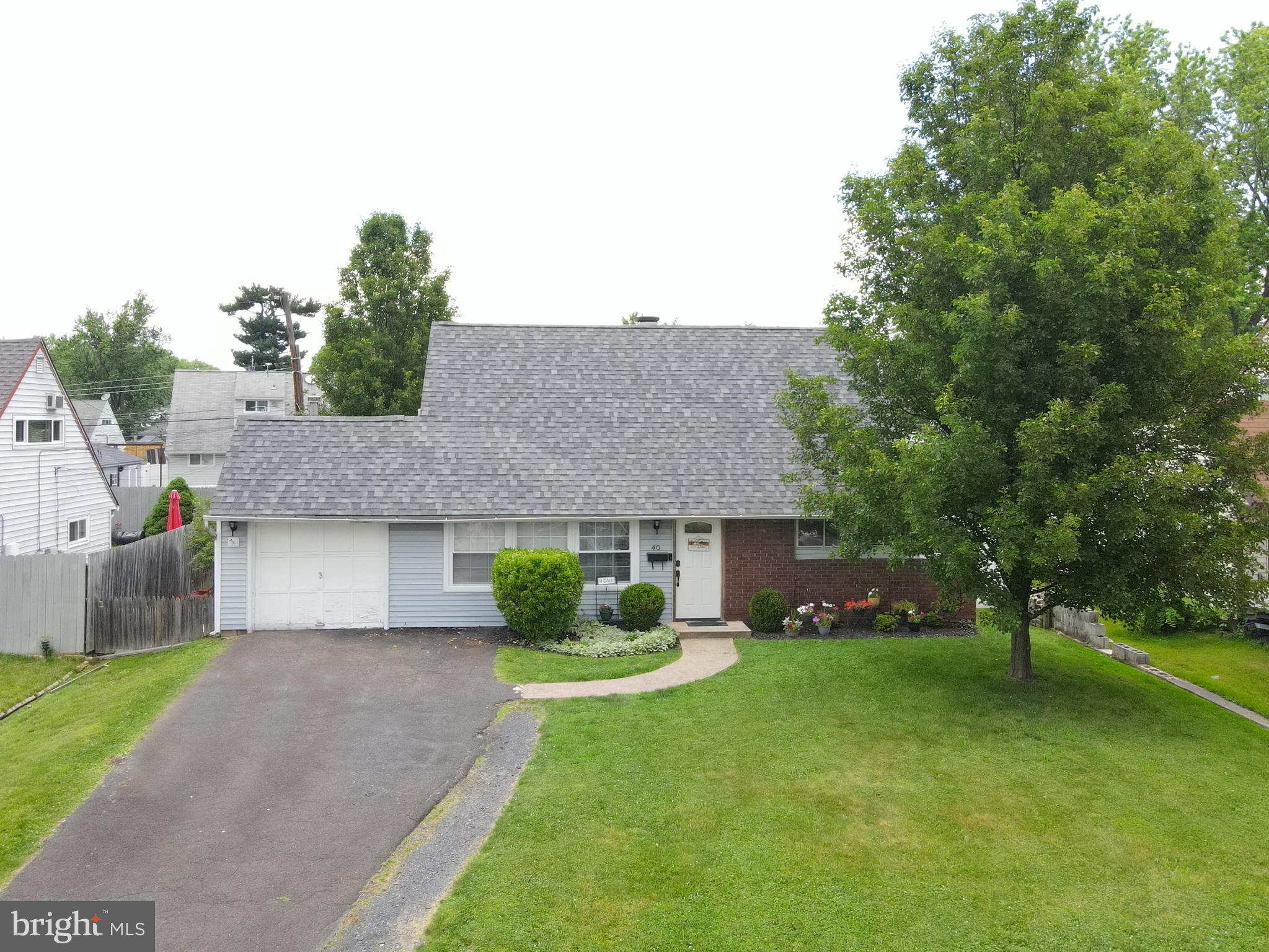 40 Mintleaf Road Levittown, PA 19056 - Photo 1 of 17 Front of the home - driveway can fit 4 cars!