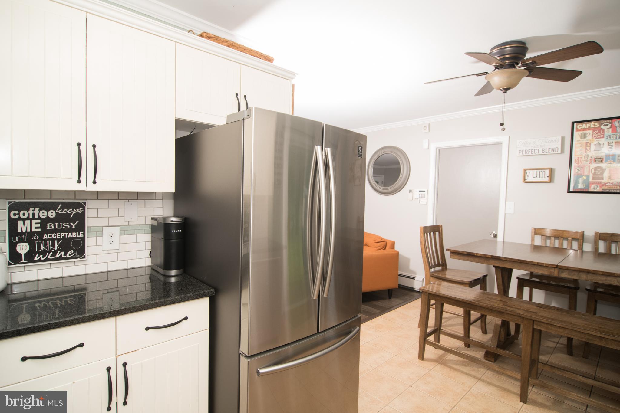 40 Mintleaf Road Levittown, PA 19056 - Photo 8 of 17 View from kitchen into dining room