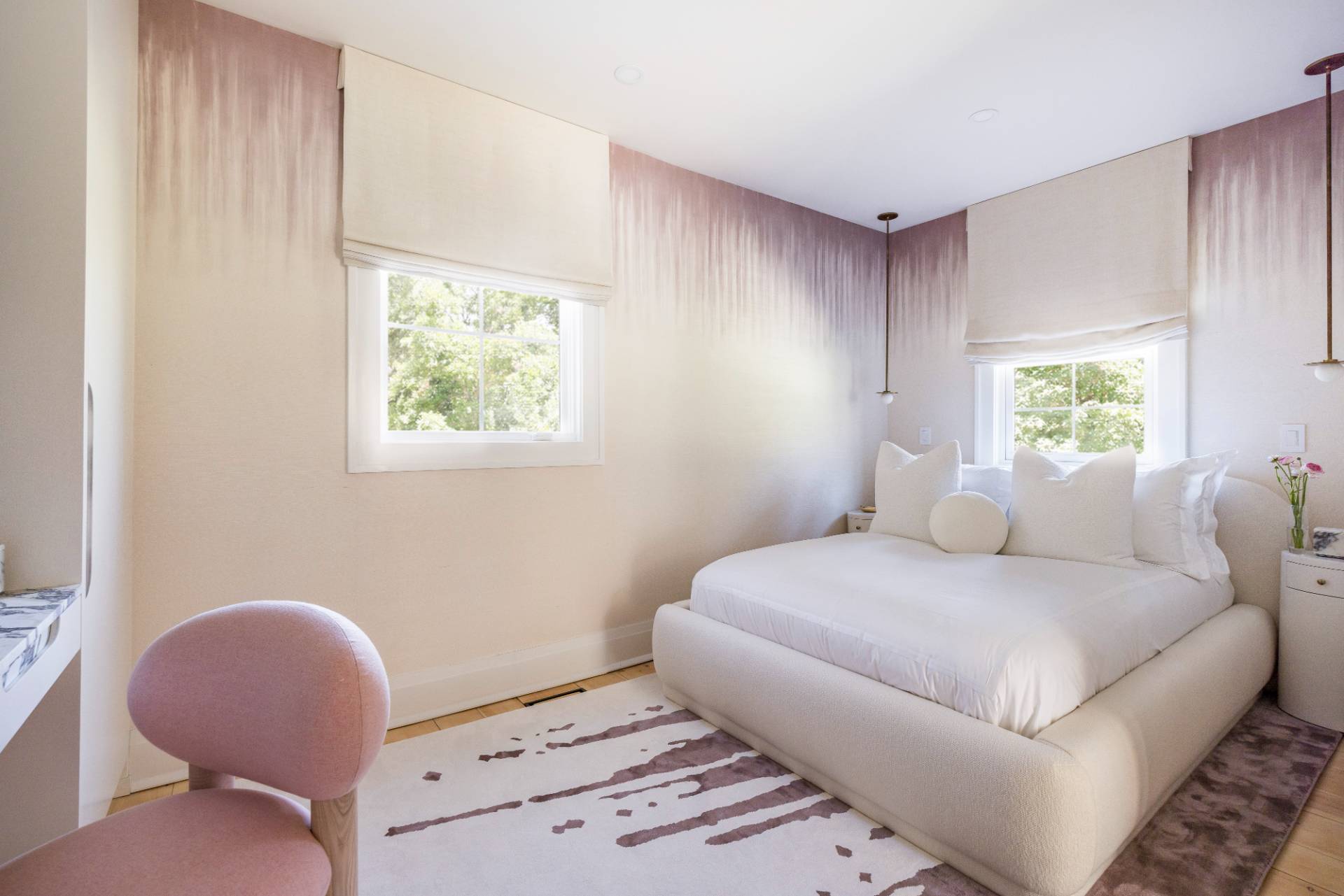 3058 Noyack Road Sag Harbor, NY 11963 - Photo 13 of 34 a bedroom with a bed and a window