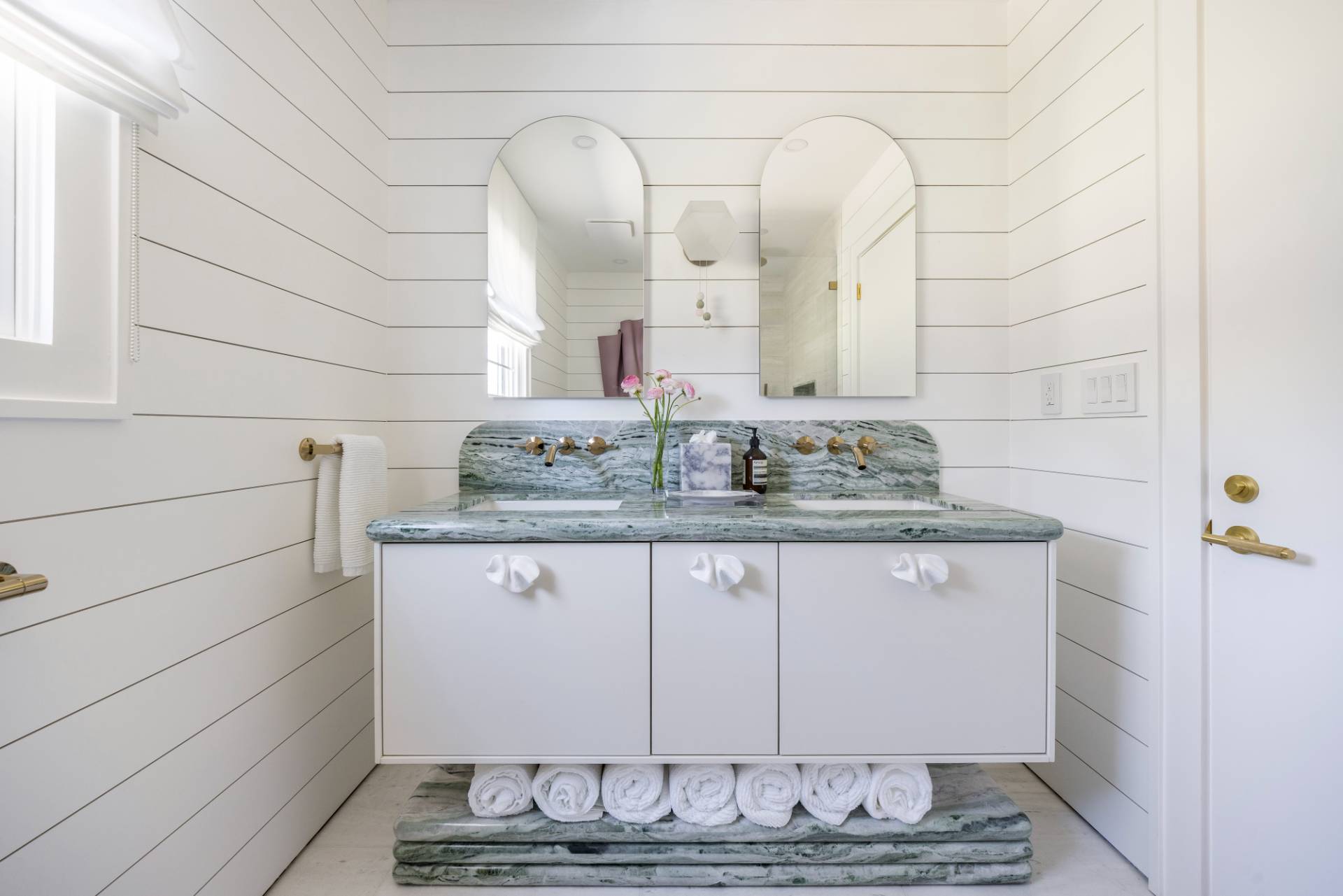 3058 Noyack Road Sag Harbor, NY 11963 - Photo 15 of 34 a bathroom with a granite countertop sink and a mirror