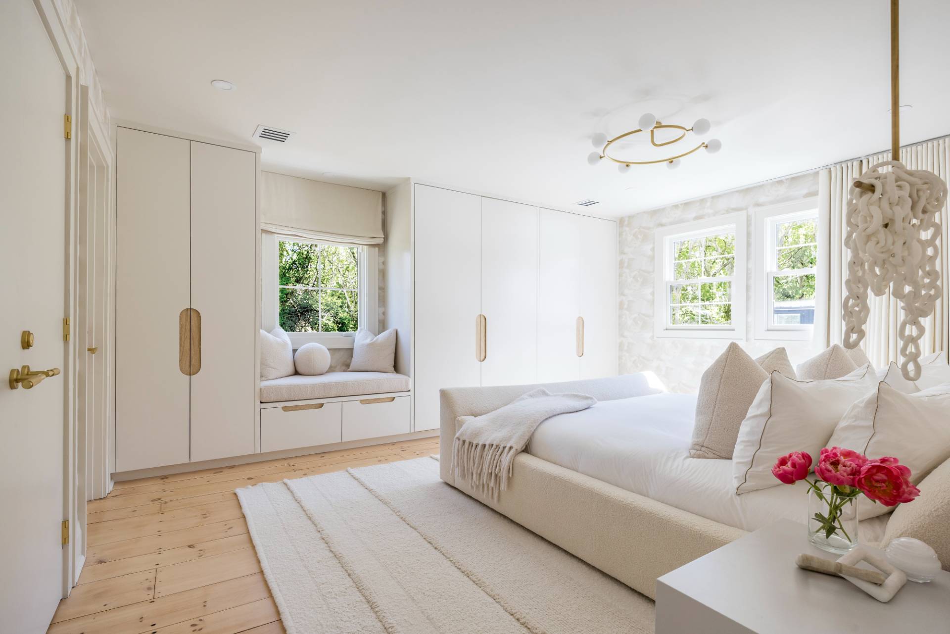 3058 Noyack Road Sag Harbor, NY 11963 - Photo 18 of 34 a living room with furniture and a chandelier
