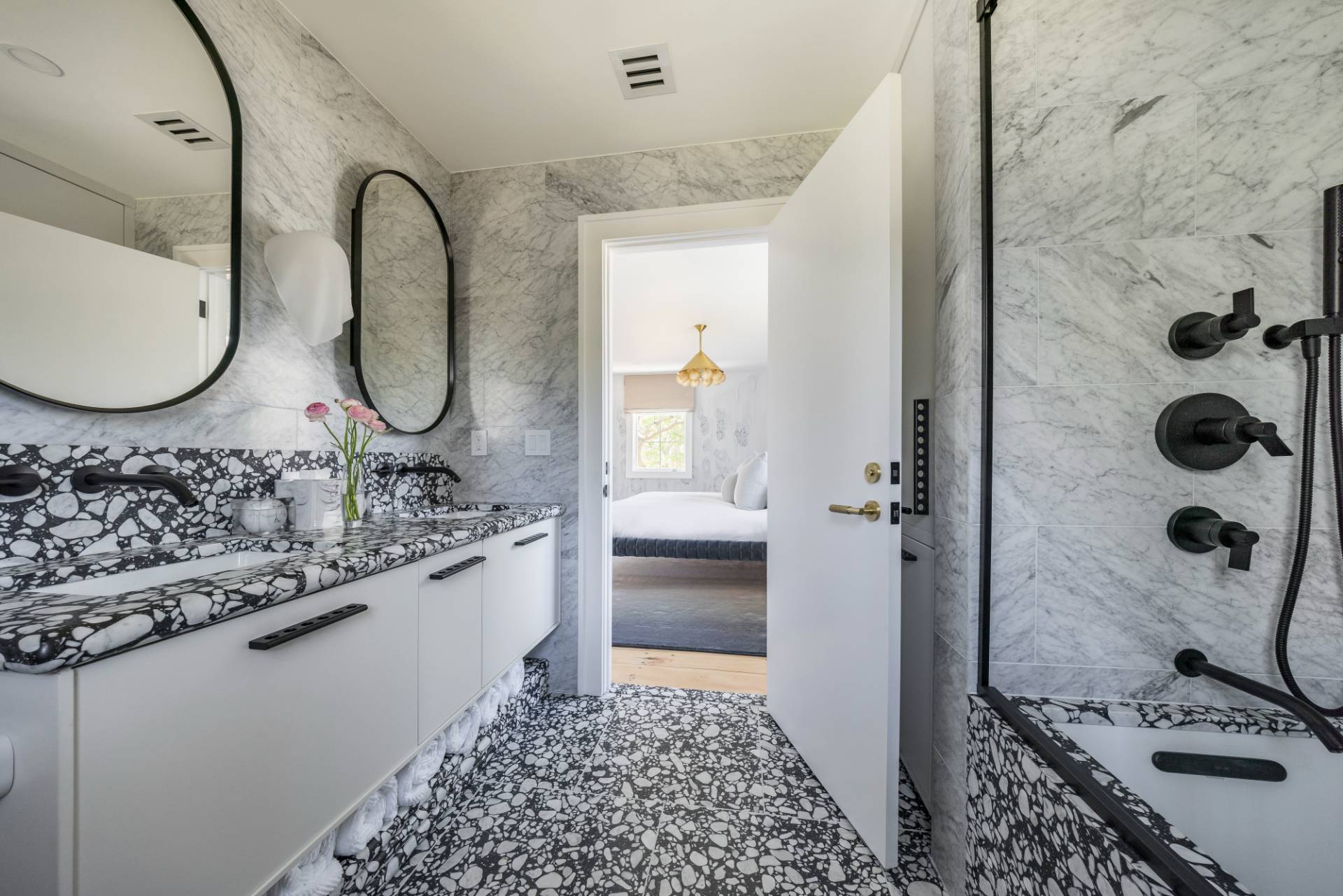 3058 Noyack Road Sag Harbor, NY 11963 - Photo 26 of 34 a bathroom with a granite countertop sink a mirror and shower
