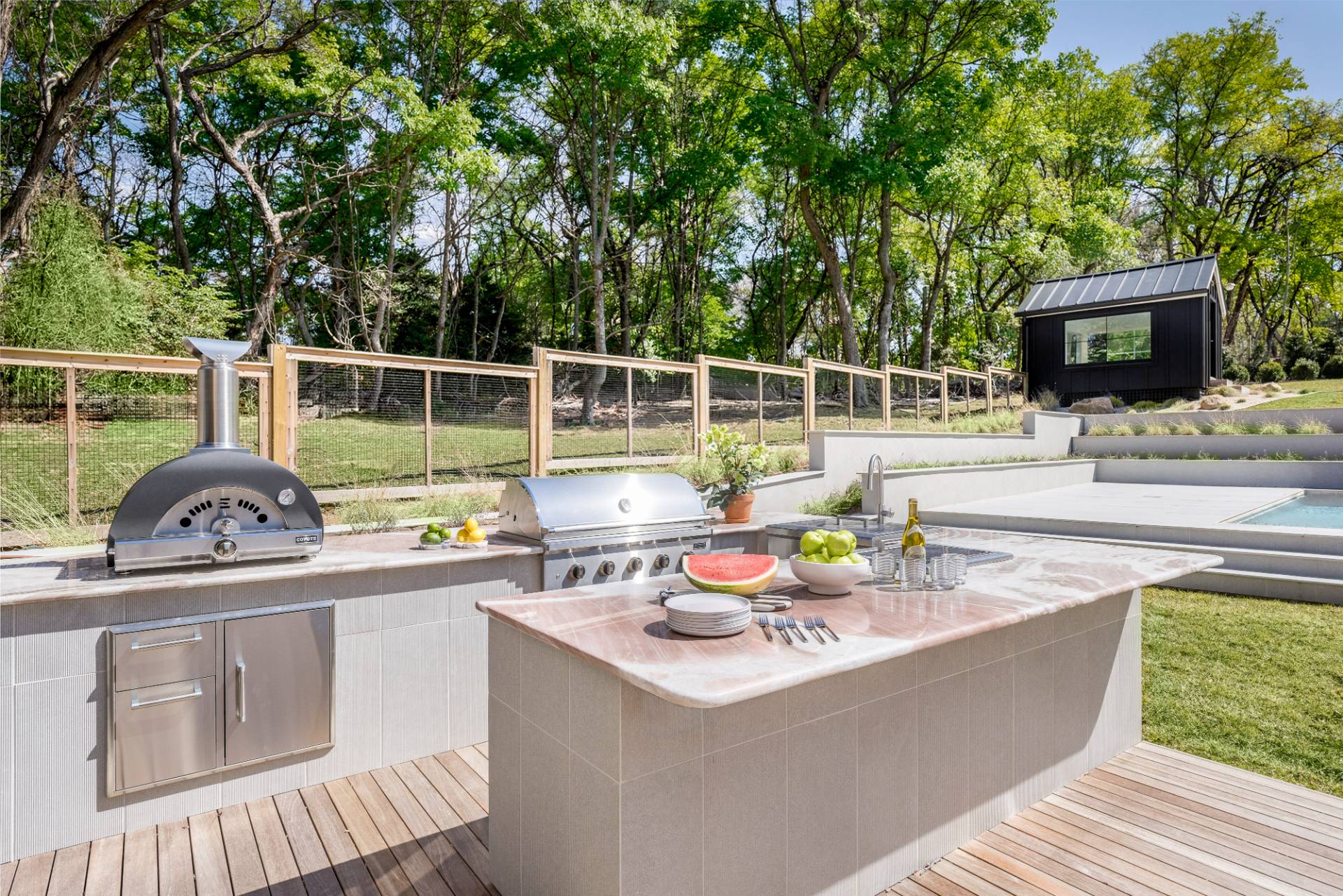 3058 Noyack Road Sag Harbor, NY 11963 - Photo 30 of 34 a view of a kitchen with a sink and dishwasher with wooden floor