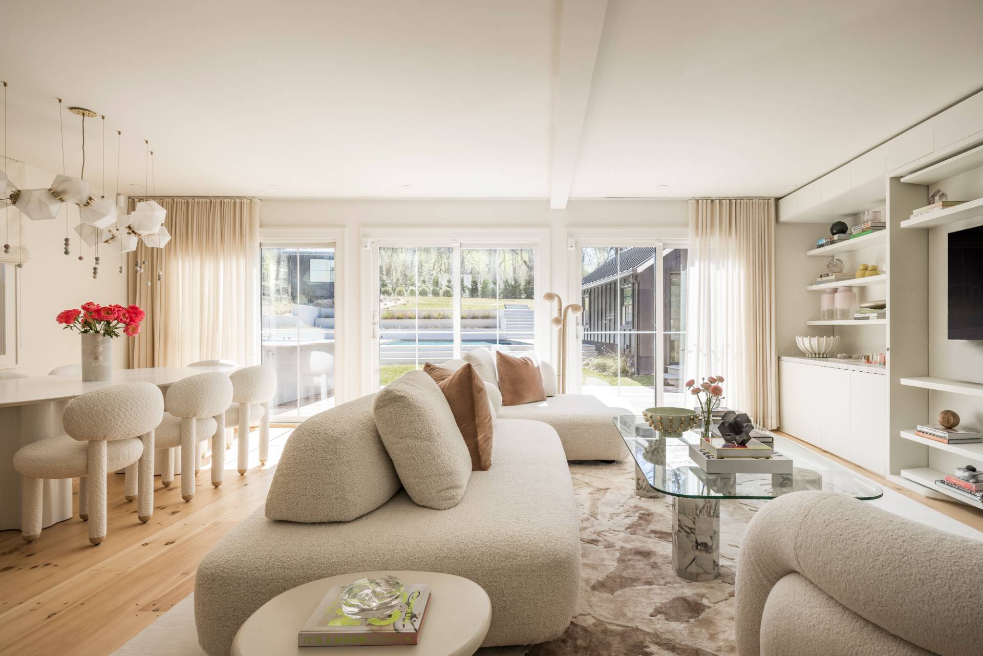 3058 Noyack Road Sag Harbor, NY 11963 - Photo 4 of 34 a living room with furniture and a large window