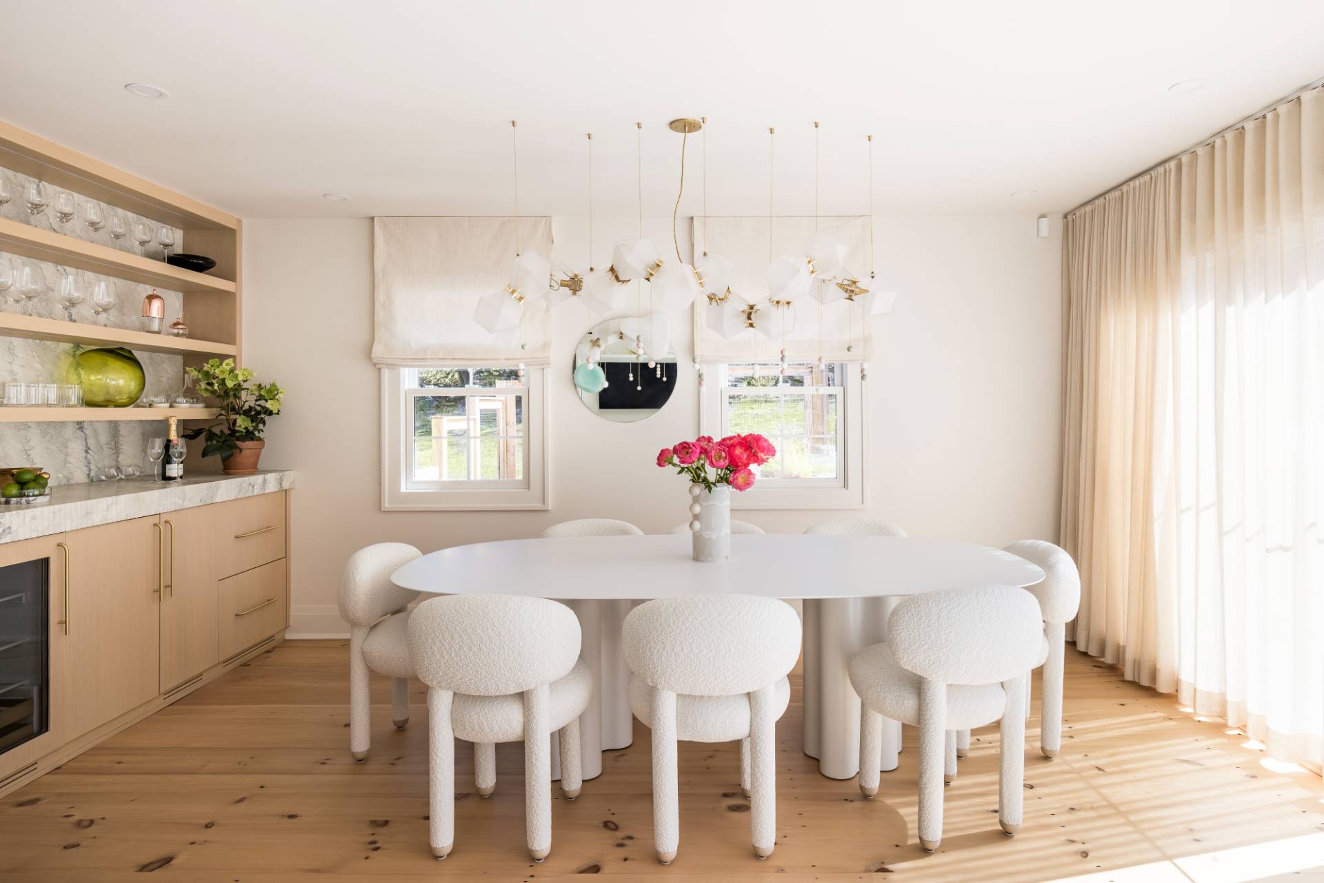 3058 Noyack Road Sag Harbor, NY 11963 - Photo 5 of 34 a view of a dining room with furniture and chandelier