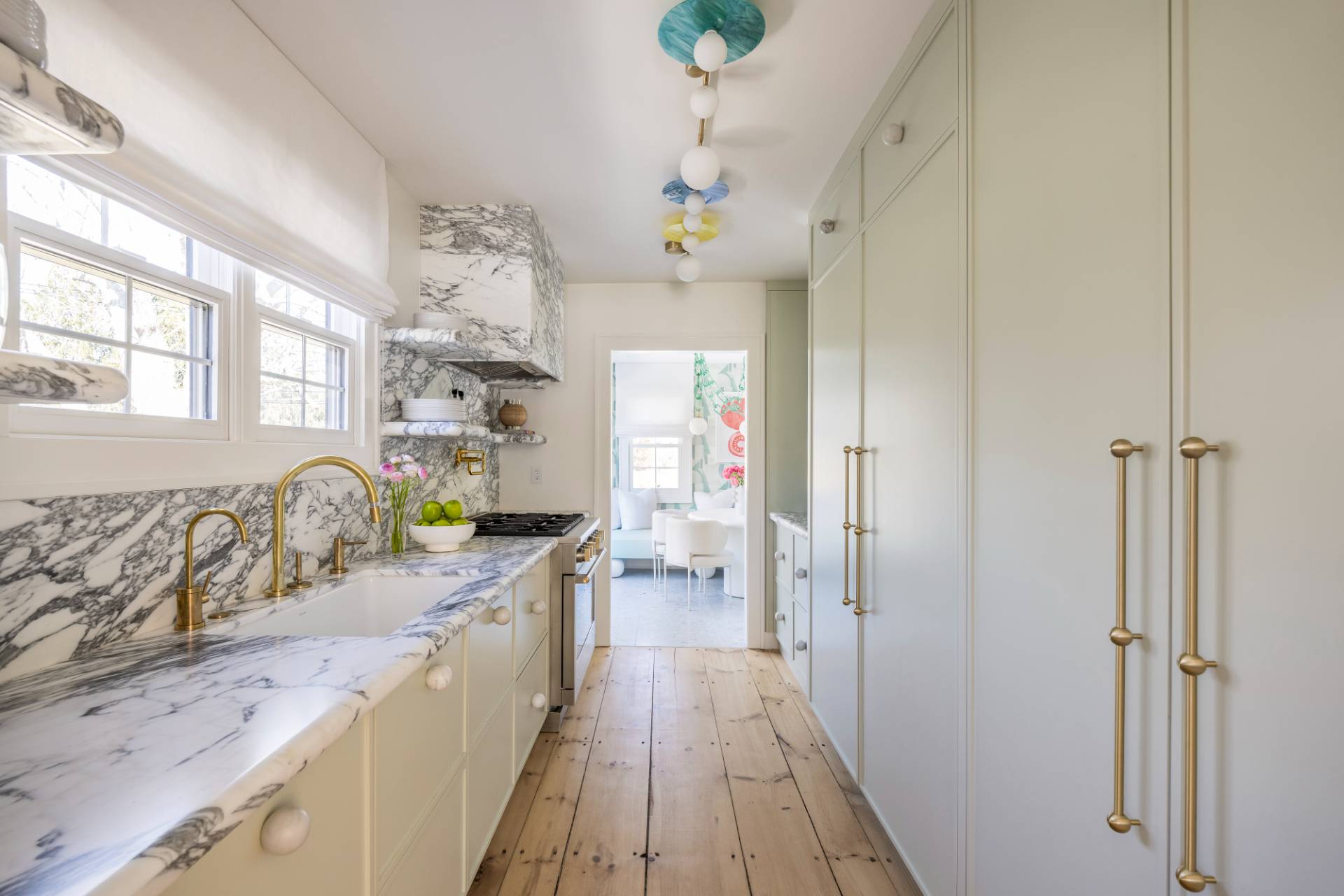 3058 Noyack Road Sag Harbor, NY 11963 - Photo 8 of 34 a spacious bathroom with a granite countertop double vanity sink a mirror and a shower