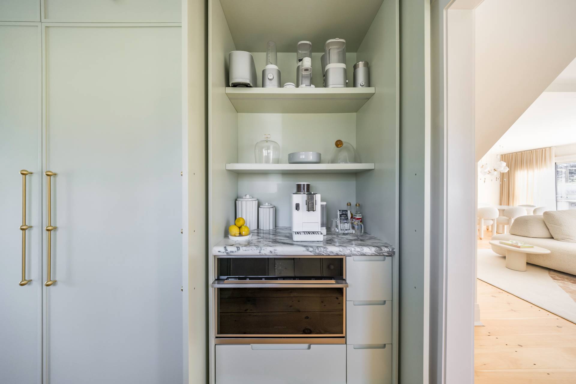 3058 Noyack Road Sag Harbor, NY 11963 - Photo 10 of 34 a view of kitchen cabinets and flat screen tv