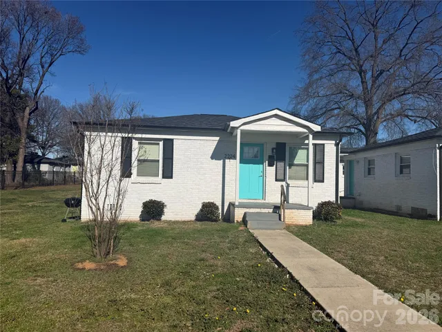 a view of entryway with stairs and wooden floor