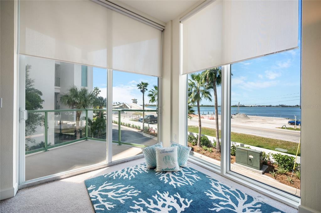 1375 Beach Road, Unit 112 Englewood, FL 34223 - Photo 13 of 50 a room with view of floor and a floor to ceiling window