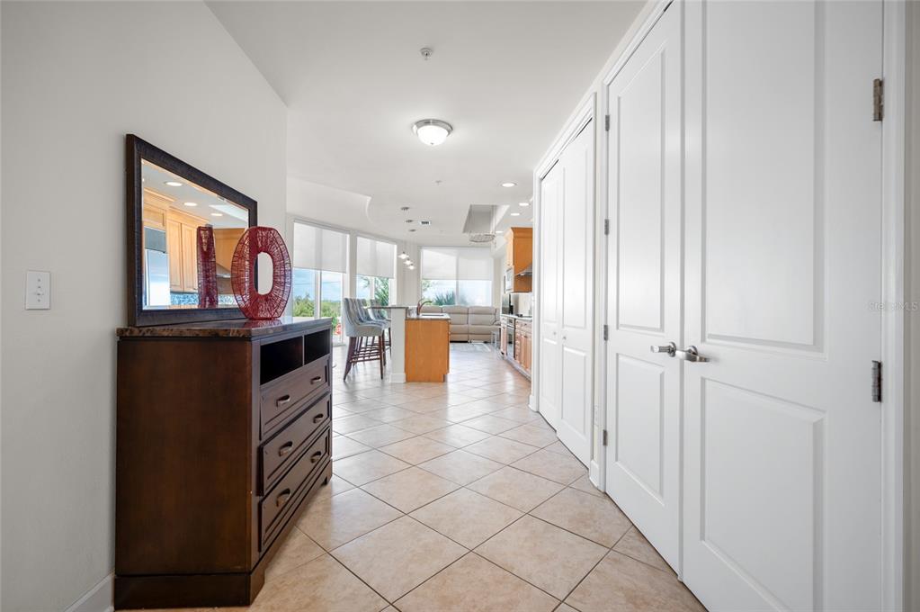 1375 Beach Road, Unit 112 Englewood, FL 34223 - Photo 19 of 50 a kitchen with stainless steel appliances granite countertop a refrigerator and a sink