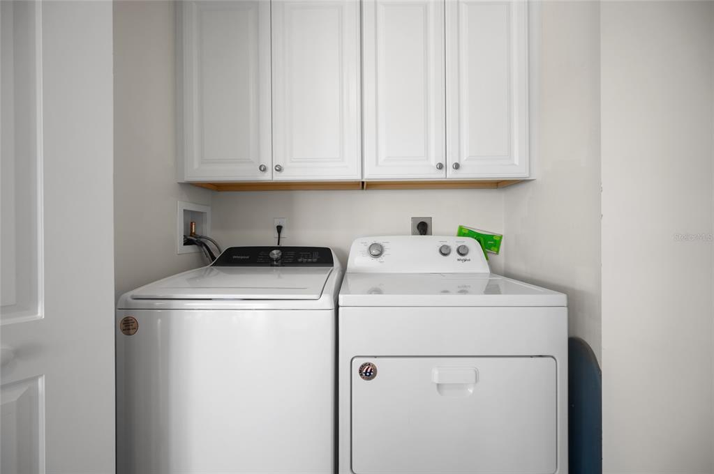 1375 Beach Road, Unit 112 Englewood, FL 34223 - Photo 20 of 50 a utility room with dryer and washer