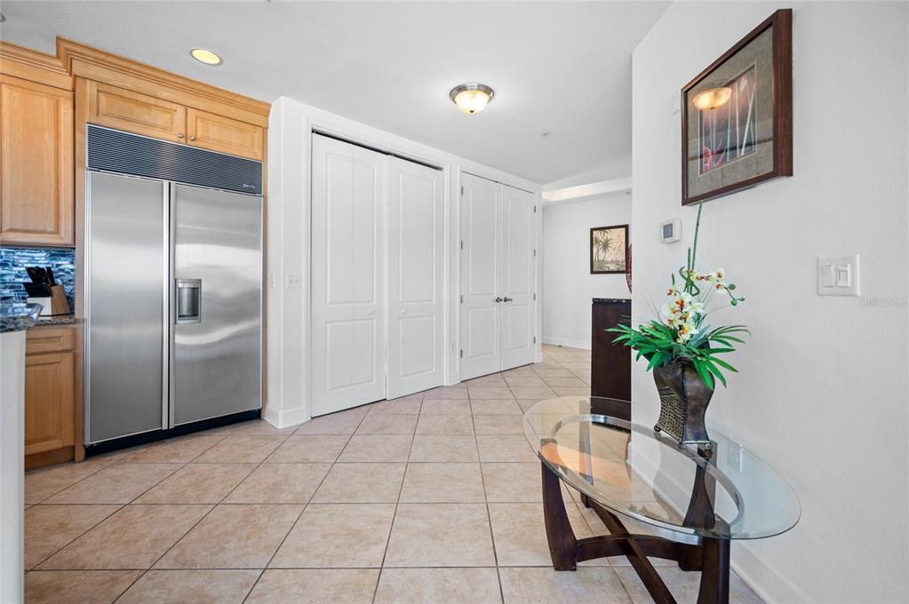 1375 Beach Road, Unit 112 Englewood, FL 34223 - Photo 21 of 50 a potted plant sitting in a kitchen next to a window
