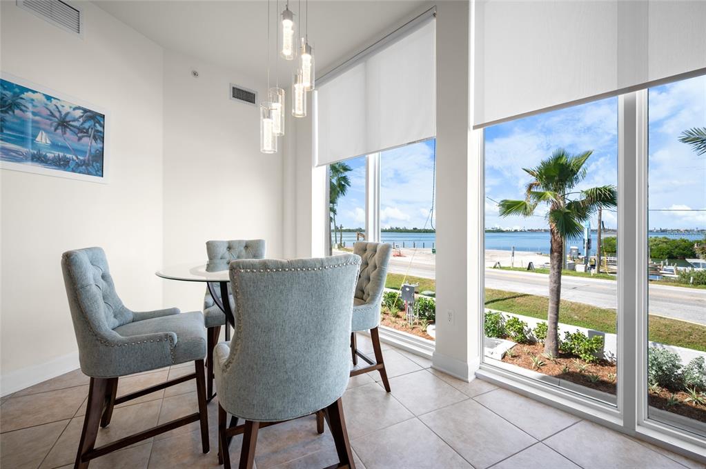 1375 Beach Road, Unit 112 Englewood, FL 34223 - Photo 29 of 50 a view of a dining room with furniture window and outside view