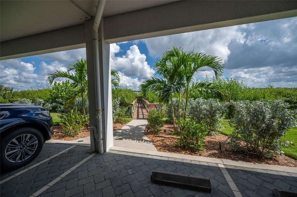 1375 Beach Road, Unit 112 Englewood, FL 34223 - Photo 34 of 50 a front view of a garden with plants