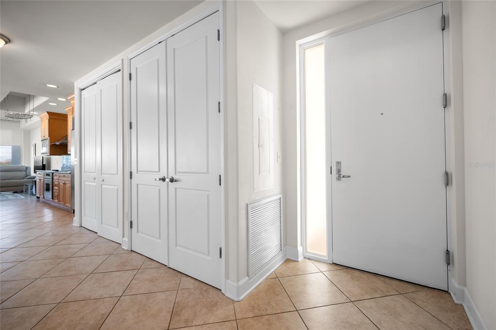 1375 Beach Road, Unit 112 Englewood, FL 34223 - Photo 5 of 50 a view of a hallway with closet and a bathroom