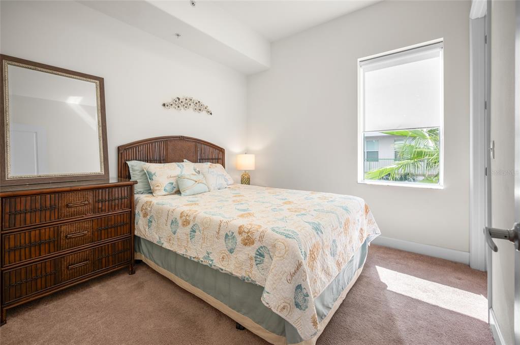 1375 Beach Road, Unit 112 Englewood, FL 34223 - Photo 7 of 50 a bedroom with a bed and a window