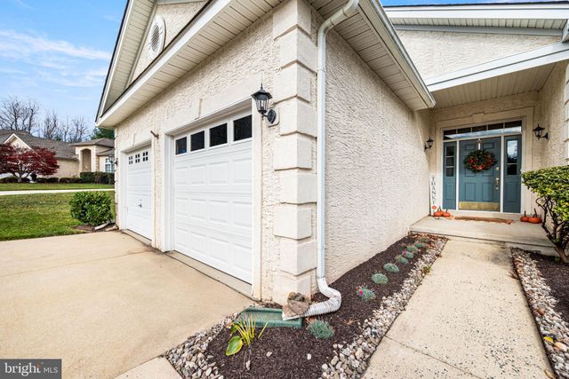 a view of a house with a door and a window