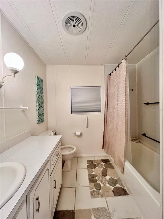 1100 South Belcher Road, Unit 663 Largo, FL 33771 - Photo 22 of 65 a bathroom with a sink toilet and shower