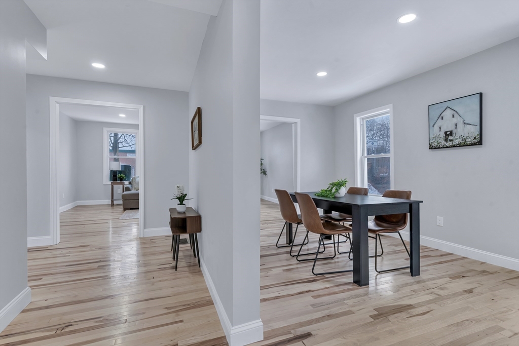 73 Walnut Street Dedham, MA 02026 - Photo 12 of 35 a view of a dining room with furniture and wooden floor
