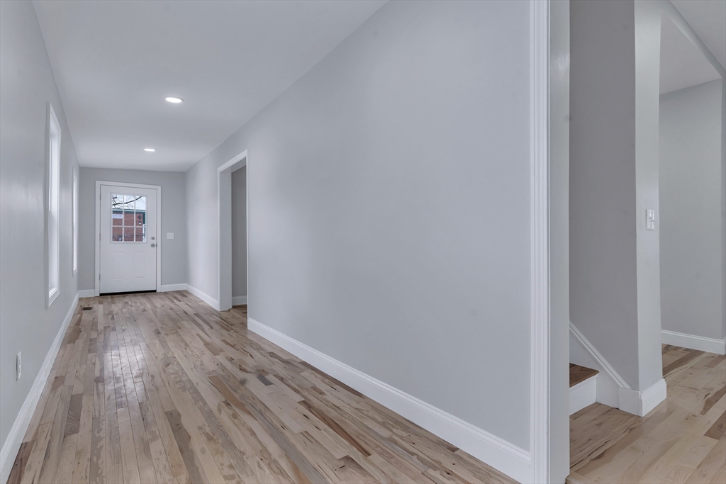 73 Walnut Street Dedham, MA 02026 - Photo 15 of 35 a view of hallway with wooden floor