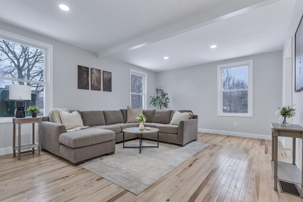 73 Walnut Street Dedham, MA 02026 - Photo 9 of 35 a living room with furniture and a window