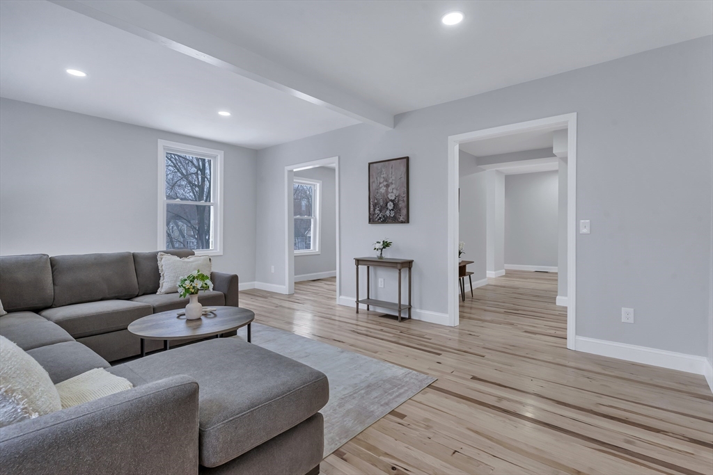 73 Walnut Street Dedham, MA 02026 - Photo 10 of 35 a living room with furniture and wooden floor