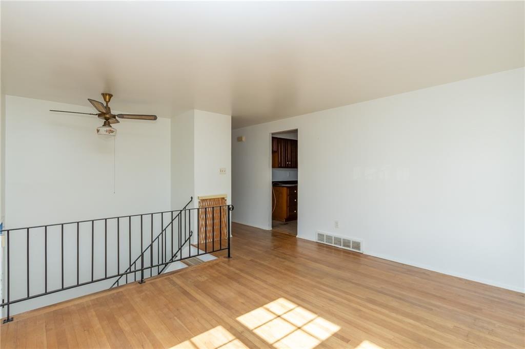 419 Manor Road Delmont, PA 15626 - Photo 13 of 30 a view of entryway with wooden floor