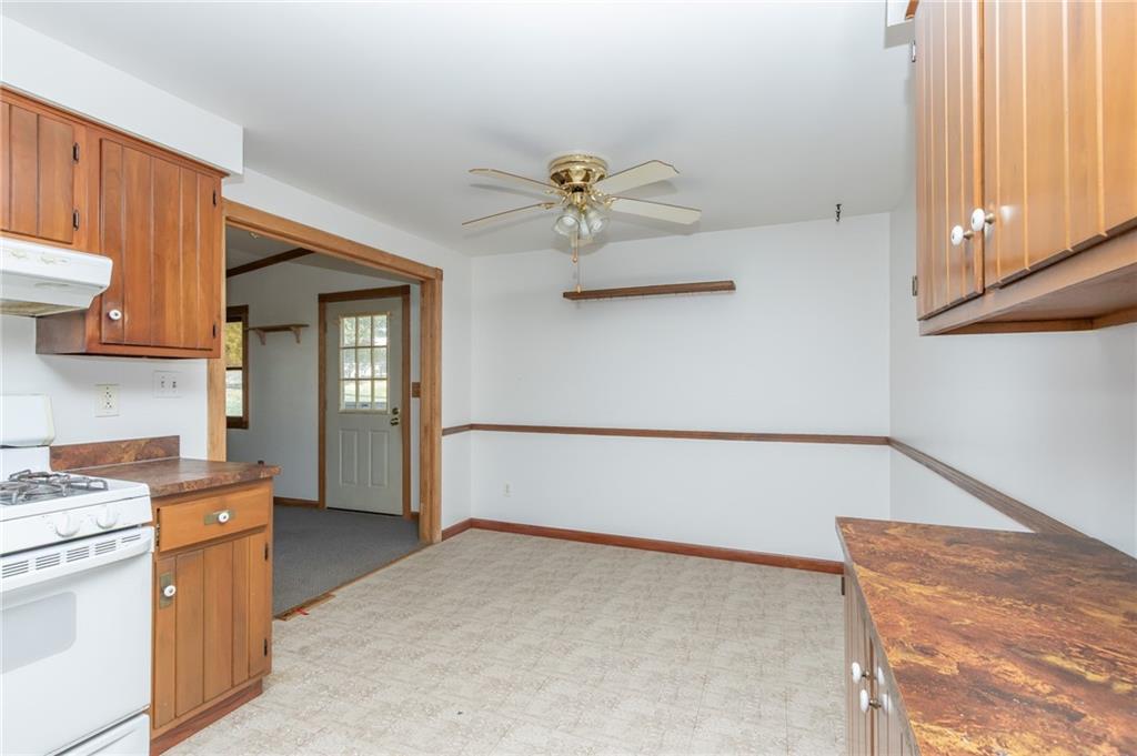 419 Manor Road Delmont, PA 15626 - Photo 15 of 30 a view of a kitchen with a sink and cabinets