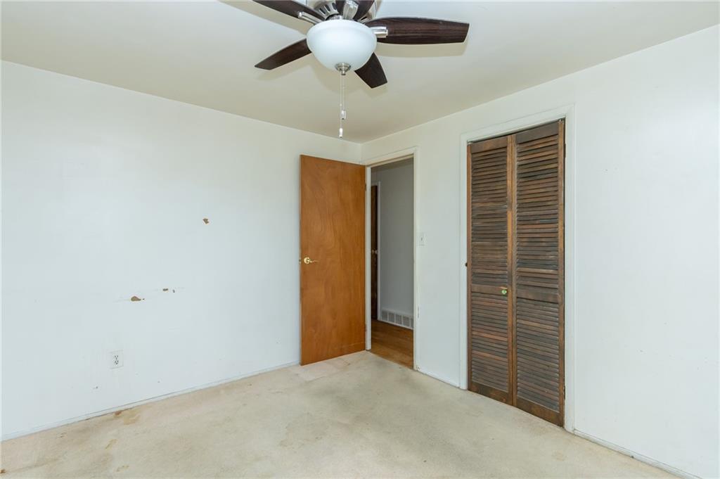 419 Manor Road Delmont, PA 15626 - Photo 20 of 30 a view of an empty room with a fan
