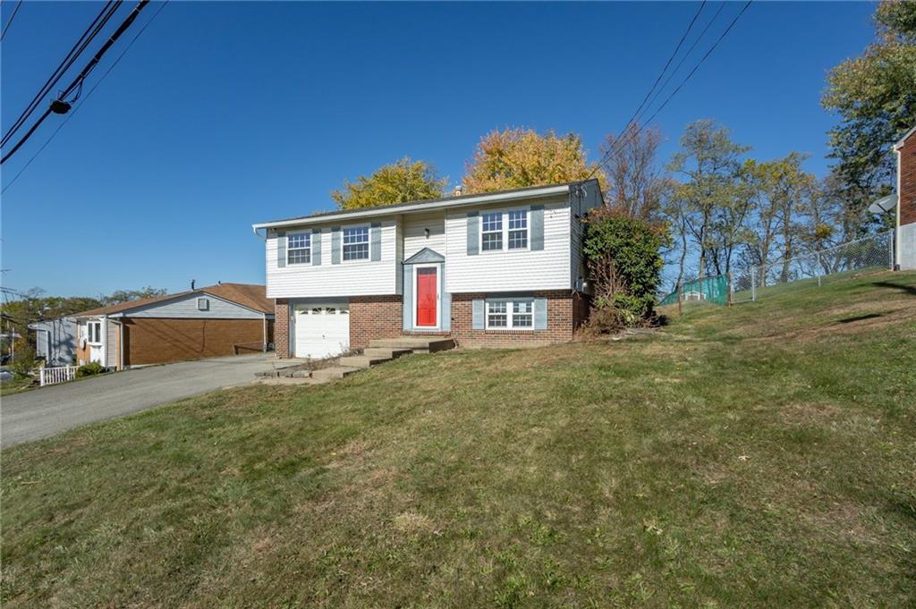 419 Manor Road Delmont, PA 15626 - Photo 2 of 30 a view of a house with a yard