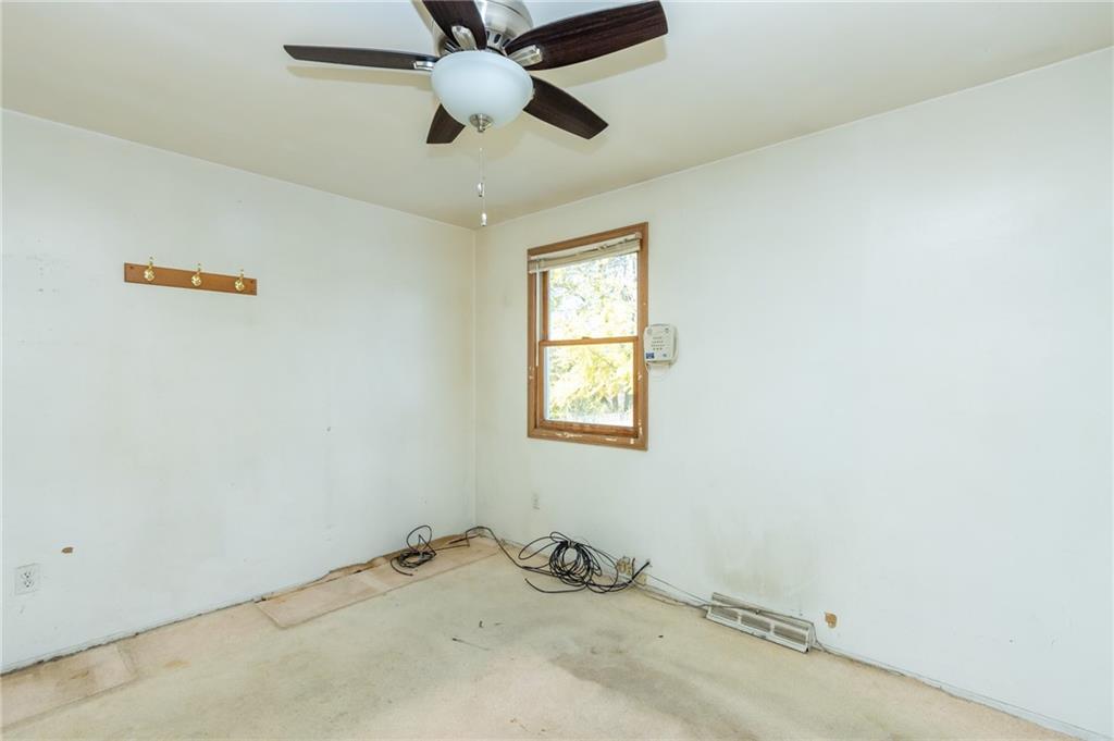 419 Manor Road Delmont, PA 15626 - Photo 21 of 30 an empty room with a window and a fan