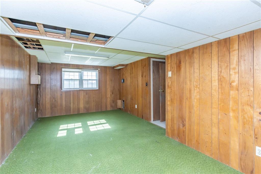 419 Manor Road Delmont, PA 15626 - Photo 29 of 30 a view of empty room with yard and entryway