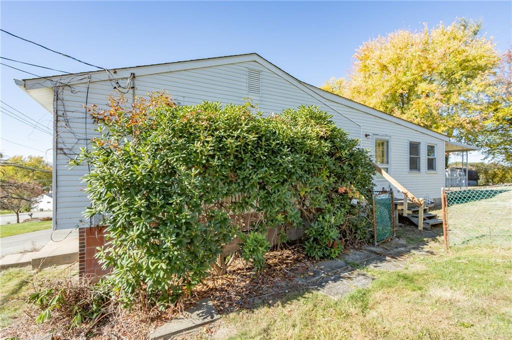 419 Manor Road Delmont, PA 15626 - Photo 5 of 30 a front view of a house with garden