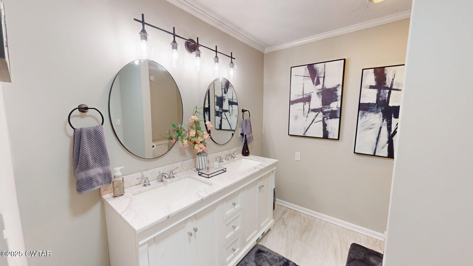 302 Flora Circle Newbern, TN 38059 - Photo 15 of 26 a bathroom with a sink and mirror