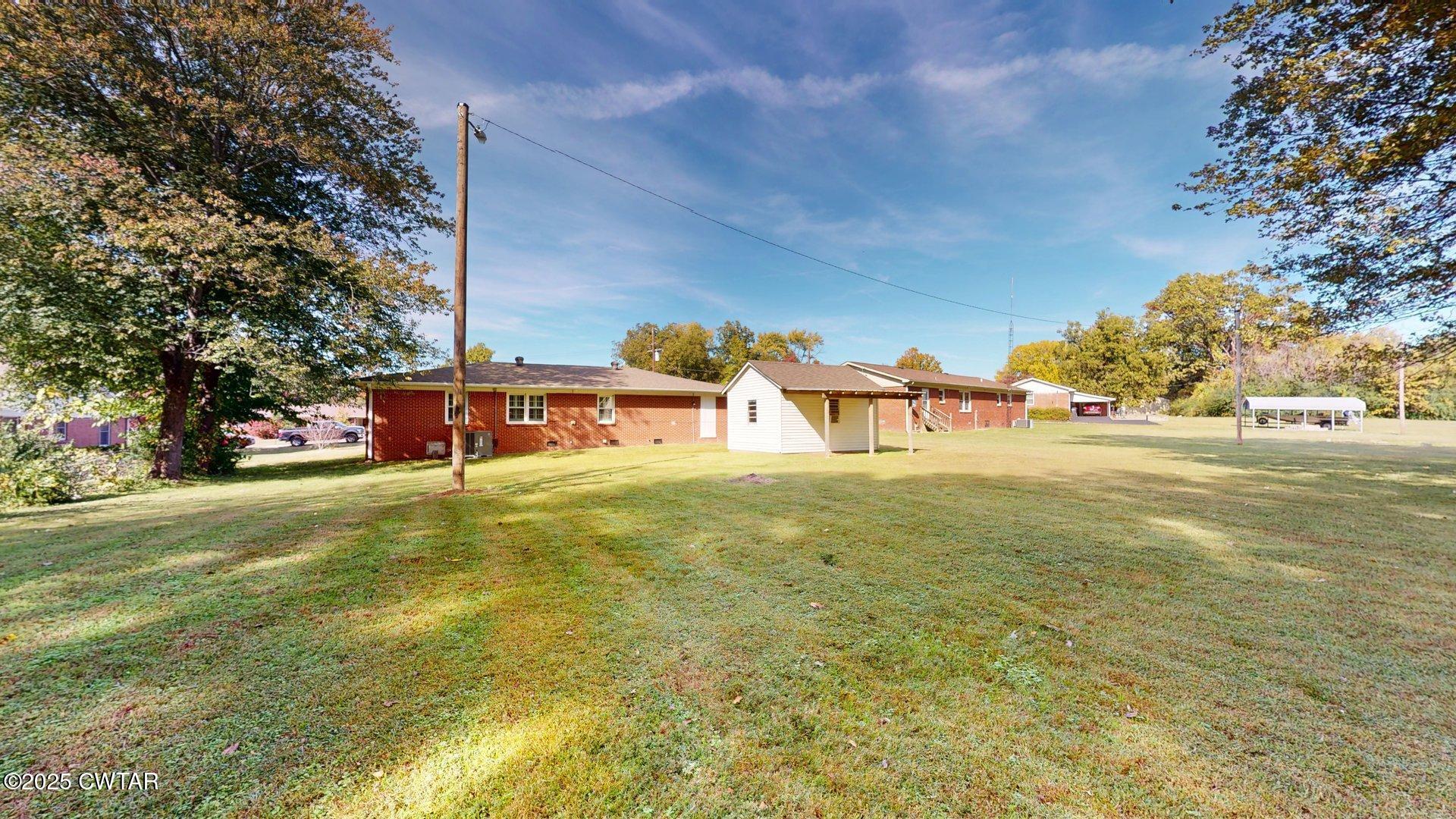 302 Flora Circle Newbern, TN 38059 - Photo 25 of 26 a view of a basket ball ground