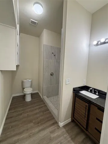 a bathroom with a toilet and a sink