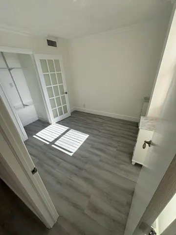 an empty room with windows