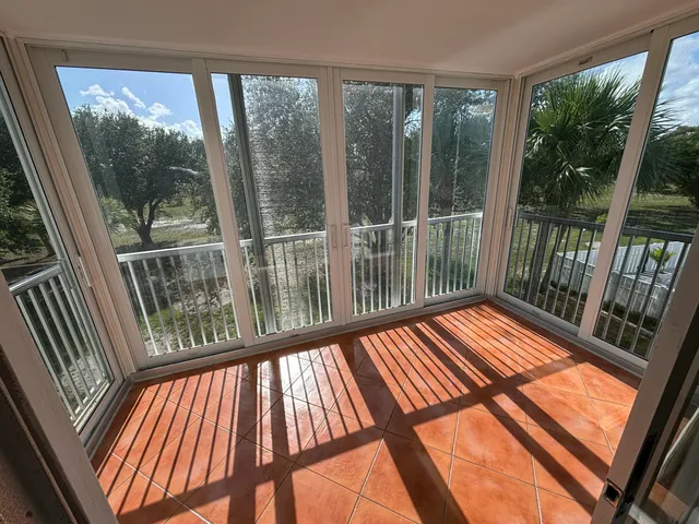 a view of a large window with an outdoor space