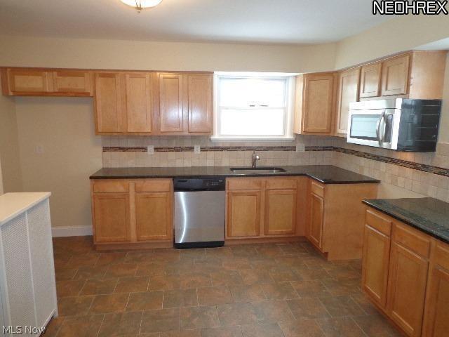 3027 Edgehill Road Cleveland, OH 44118 - Photo 6 of 18 Look forward to preparing meals in this completely remodeled kitchen!