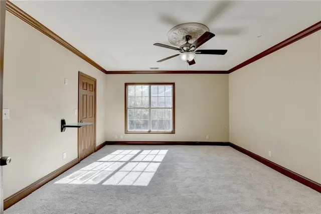 a spacious bathroom with a granite countertop sink a mirror and a shower